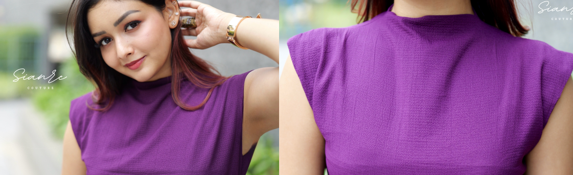 Purple sleeveless top worn by a model with close-up of neckline.